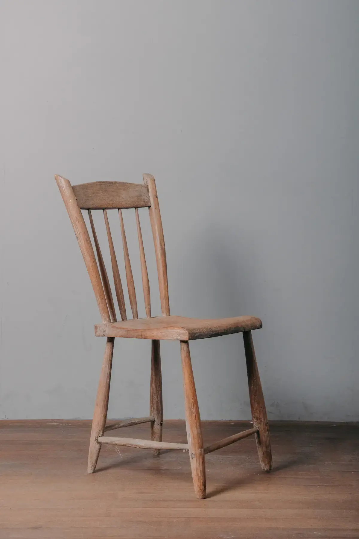 The Bryne wooden dining chair on an oak floor